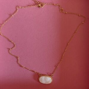 Elegant Gold Necklace with White Pendant